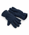 A pair of fleece gloves by Beechfield, in navy blue with elastic wrist cuffs, set against a white background. The product is labeled as B298R.