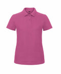 The B&C Collection's B306F is a plain magenta polo shirt featuring short sleeves, a collar, and three buttons.