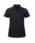 A B&C Collection B306F plain black polo shirt, featuring a classic collar and a short-sleeve design with a three-button placket, showcased against a white background. The shirt is tailored with a simple and refined fit.