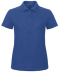 The B306F by B&C Collection is a plain blue polo shirt featuring short sleeves, a collar, and a three-button placket down the front.