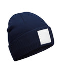 The Beanies product features a navy blue knitted design with a folded brim and a plain white rectangular patch on the front, shown against a white background.