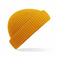 A vivid orange Beechfield B383R knitted beanie with a folded cuff, floating above a white background. Its ribbed pattern adds texture, and the vibrant color is eye-catching.