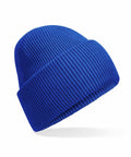 A Beechfield B385R knitted beanie in a vibrant blue color with a folded brim, showcased on a plain white background.