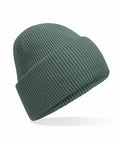 A Beechfield B385R green knit beanie hat with a folded brim, isolated on a white background, features ribbed stitching for a soft and cozy texture.