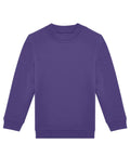 A solid purple, long-sleeve crewneck sweatshirt is displayed flat on a white background.