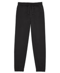 Tracksuit bottoms in plain black, featuring an elasticated waistband, drawstring, and elasticated ankle cuffs, displayed flat on a white background.