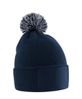 Beanies: Navy blue knitted beanie with a ribbed cuff, solid front patch, and a mixed navy and white bobble on top.