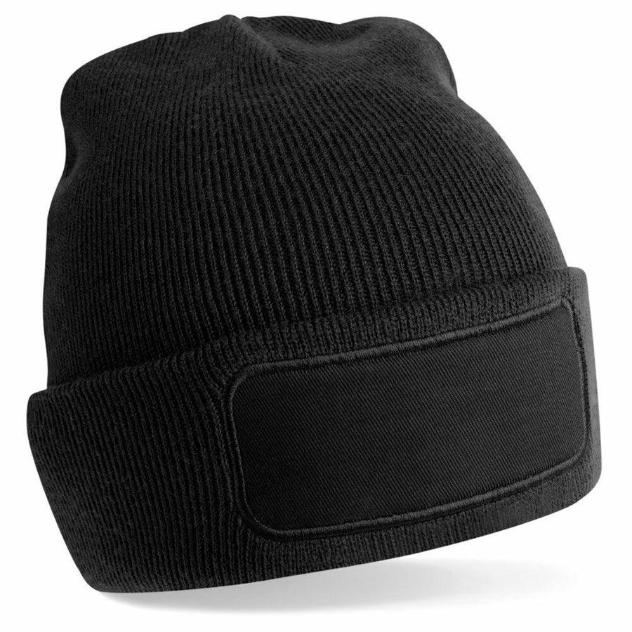 A Beechfield B445R black knit beanie featuring a blank rectangular patch on the front.