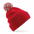 Beechfield B450R knit beanie in red, featuring a white and red pom-pom on top.