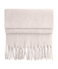 Scarves in light beige are neatly folded with ends down. They have a soft texture and thick, twisted fringe along the bottom edge, shown against a plain white background.