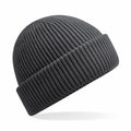 A Beechfield B508R ribbed knit beanie in dark gray, featuring a folded cuff, displayed on a white background.