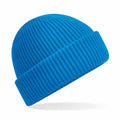 A vibrant blue Beechfield B508R knit beanie hat featuring a folded brim, showcased against a plain white background.