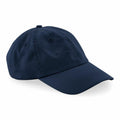 A Beechfield B652N baseball cap in dark blue, featuring a curved brim and button top, viewed from a slight angle. The cap is plain with no visible logos or patterns, emphasizing its simple design and durable fabric.