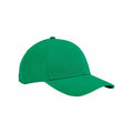 A Beechfield B821B baseball cap, featuring a plain green design with a curved brim and a button top, is positioned slightly to the side against a white background.