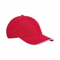 Introducing the Beechfield B825C: a vibrant red baseball cap featuring a curved brim with a sleek white trim along the edge. It is topped with a button and crafted from soft fabric for ultimate comfort.