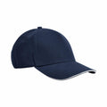 Product B825C by Beechfield: A plain navy blue baseball cap featuring a white trim along the edge of the brim, displayed against a white background.