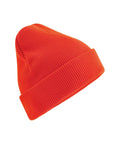 A bright orange beanie knit hat featuring a folded cuff, shown on a white background.