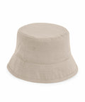 Introducing the Beechfield B90NB, a beige bucket hat featuring a wide brim and two small ventilation grommets on the side, crafted with a simple, unadorned design.