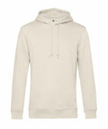The BA001 from B&C Collection is showcased against a white background, featuring a simple and casual design. This plain beige hoodie includes a drawstring hood, long sleeves, and ribbed cuffs, with its fabric appearing soft to the touch.