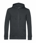 B&C Collection's BA002: A black zip-up hoodie featuring drawstrings and front pockets.