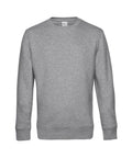The BA010 sweatshirt from B&C Collection is showcased against a white backdrop. It features long sleeves and ribbed cuffs, embodying a straightforward and timeless design.