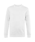 This is the B&C Collection's BA010, a plain white crewneck sweatshirt featuring long sleeves and ribbed cuffs. The garment is laid out on a flat surface against a white background, highlighting its simple and minimalist design.
