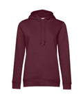 The BA01F maroon long-sleeve hoodie from B&C Collection features a front pocket, drawstring hood, and ribbed cuffs, displayed on a plain white background.