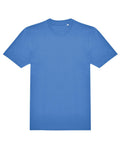 A medium blue, short-sleeved crew neck T-shirt is laid flat on a white background.