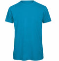 The BA118 from B&C Collection, a turquoise T-shirt, is showcased against a white background.