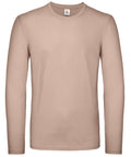 A plain, beige long-sleeve t-shirt from the B&C Collection (Product Name: BA211) is displayed against a white background. The shirt features a crew neck and a simple design with no visible patterns or logos.