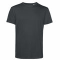 The BA212 t-shirt by B&C Collection in a solid dark green color is displayed on a white background.