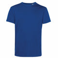 The BA212 from B&C Collection is featured against a white background. This plain blue T-shirt has short sleeves and a round neckline.