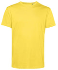 A BA212 t-shirt from B&C Collection, featuring a plain yellow design with short sleeves and a simple crew neck, displayed against a white background.