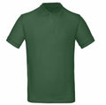 A B&C Collection BA260 polo shirt in solid green, featuring short sleeves and a collar, showcased on a white background.