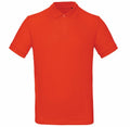 The BA260 by B&C Collection is a bright red short-sleeve polo shirt featuring a collar and button-down front.
