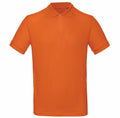 The BA260 by B&C Collection is an orange short-sleeve polo shirt featuring a collared design and button-up placket, displayed on a plain white background.