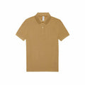 The BA261 polo shirt by B&C Collection is a plain tan design with short sleeves, a collar, and two buttons. It is showcased against a white backdrop.