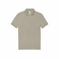 The BA263 by B&C Collection is a beige polo shirt featuring short sleeves and a collar, with a three-button placket at the front. It is displayed laid flat against a plain white background.