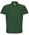 The BA306 polo shirt from B&C Collection features a plain dark green color, short sleeves, and a classic collar, showcased against a white background.