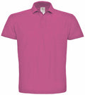 The BA306 by B&C Collection is a solid pink polo shirt featuring short sleeves and a classic collar, showcased against a plain white background.