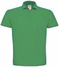 The BA306 by B&C Collection is a plain green polo shirt, featuring short sleeves and a collar, set against a white background.