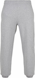 The BB002 gray sweatpants from Build Your Brand Basic feature an elastic waistband and ankle cuffs, as shown in the back view. The fabric looks soft and comfortable, making them ideal for casual wear or exercise.