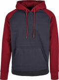 Product BB005 by Build Your Brand Basic is a hoodie featuring a dark gray body, complemented by vibrant red sleeves and hood. It includes a convenient front pocket and red drawstrings.