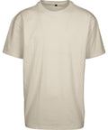 A beige, short-sleeved T-shirt with a crew neckline and loose fit, shown on a white background. The T-shirts product features no visible logos, patterns, or designs.