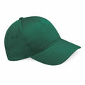 The BC015 by Beechfield is a plain green baseball cap featuring a curved brim and an adjustable strap.