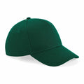 The Beechfield BC018 is a plain green baseball cap featuring six panels, a button on top, and a curved brim.