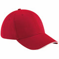 Introducing the Beechfield BC020: a striking bright red baseball cap featuring a curved brim and a button on top, designed for a clean and minimalist aesthetic without any visible logos or designs.