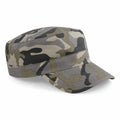 A BC033 cap by Beechfield, featuring a gray and green camouflage military-style design with a flat top and curved brim.