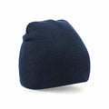 A Beechfield BC044 navy blue knit beanie with a simple, classic design, displayed against a plain white background.