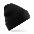 The Beechfield BC045 is a black knit beanie featuring a folded brim, showcased on a white background.